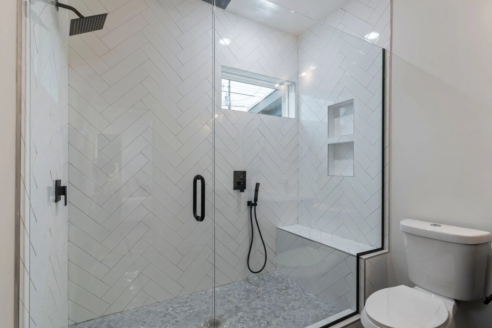 Basement bathroom with glass shower